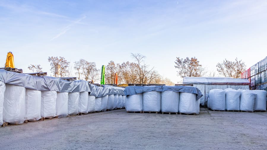 Bulk bags stored in exterior warehouse
